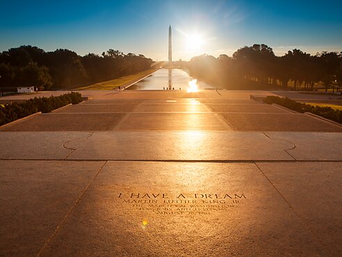 A portrait of the Washington Monument and a memorial "I have a Dream" marker